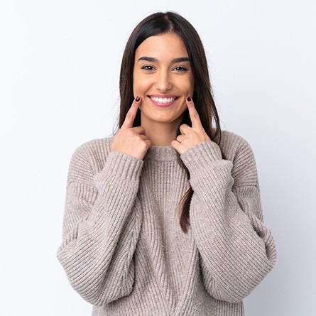 Smiling woman showing off her bright white teeth