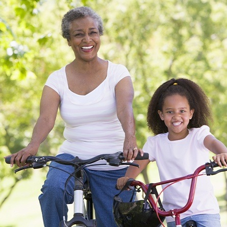 Grandmother and daughter on bike