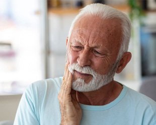 Man with tooth pain in San Antonio
