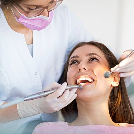 woman having oral hygiene checked