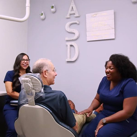 San Antonio dentist laughing with patient