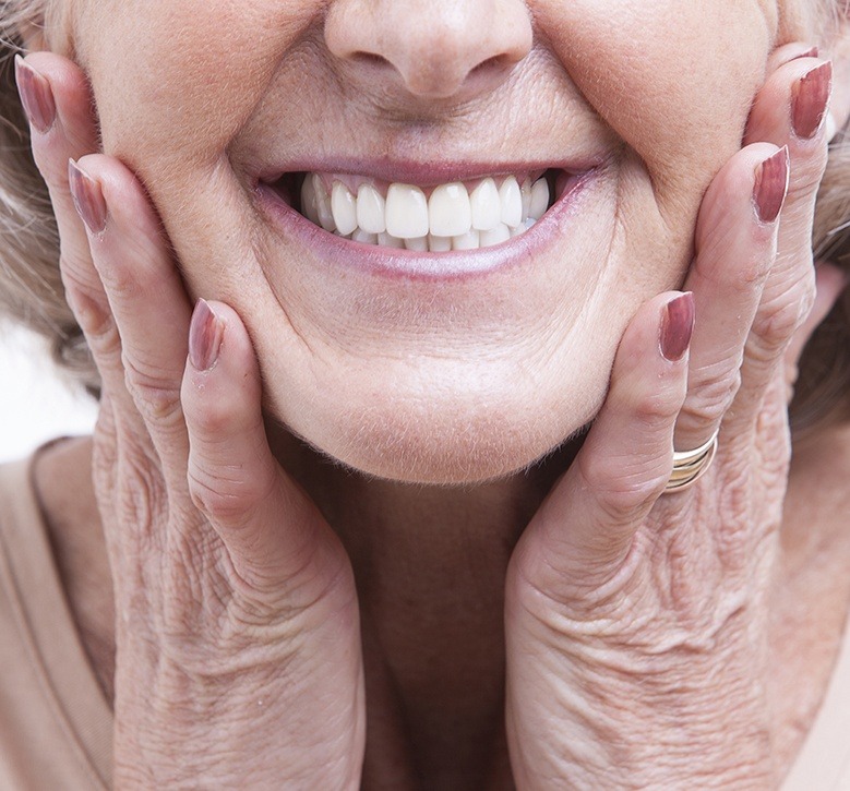 woman framing smile