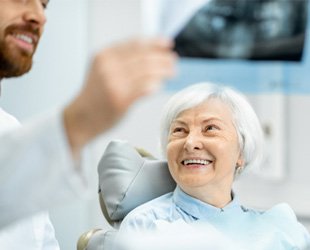 patient having dental implant consultation