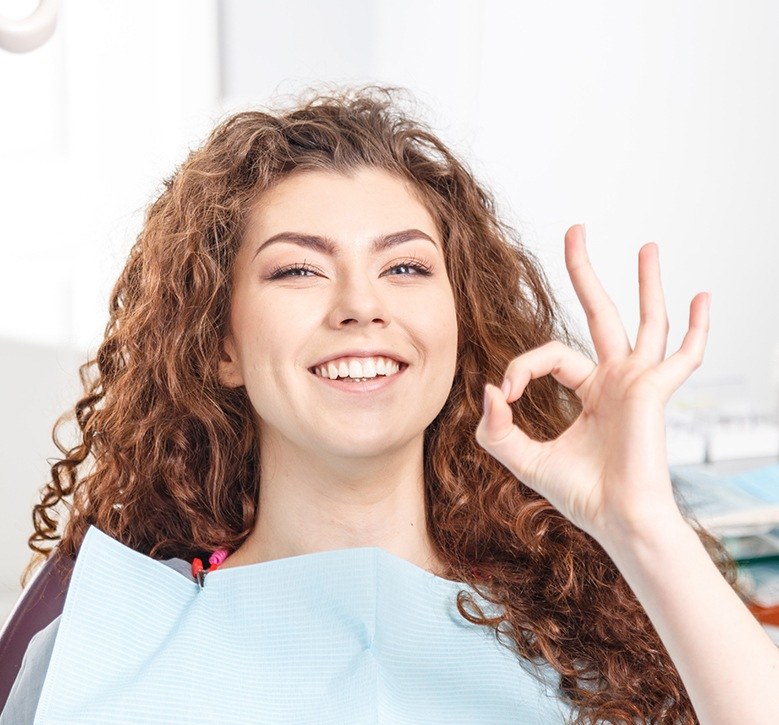 woman doing okay sign