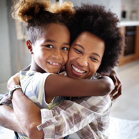 mother and daughter hugging