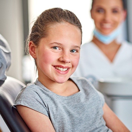 young girl smiling at camera