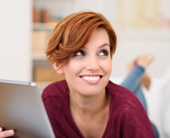 red haired woman smiling