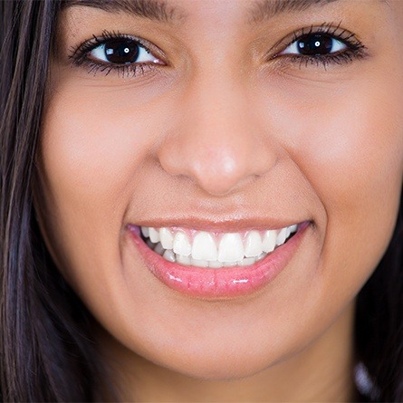 close up of girl with white smile