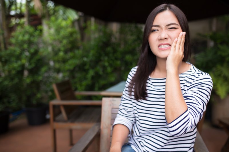 woman with tooth pain 