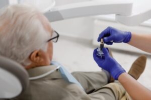 patient talking about dental implants with a provider